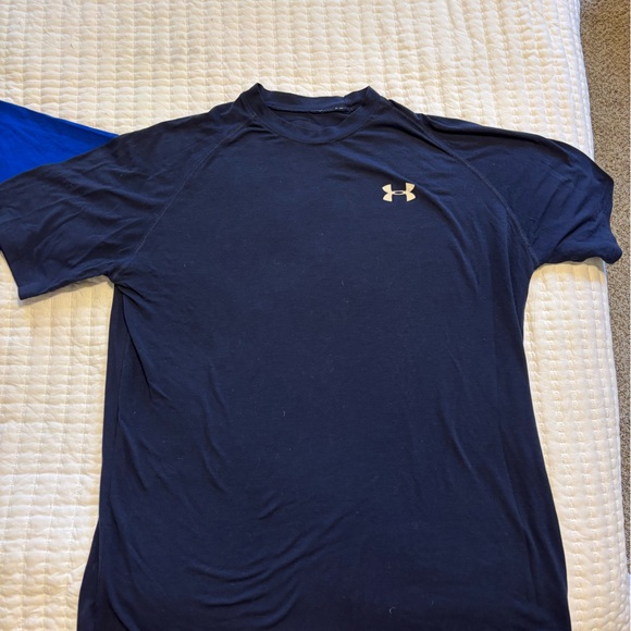 Under Armour shirts. Two shirts.
Navy and Blue.
Size small - Picture 2 of 7